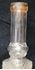 Picture of Tall 1800’s bottle with lion heads