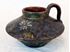 Picture of Antique redware vessel with flower design