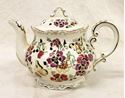 Picture of Zsolnay tea pot 6 1/2" x 9 1/2" x 5". Marked on the bottom.  